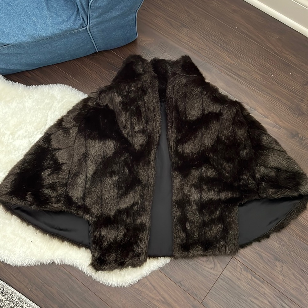 Brown fur caplet shall